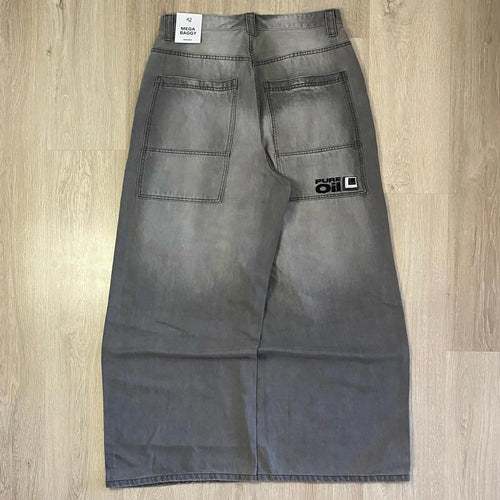 Jeans Baggy con Estampado Gráfico y Ojales