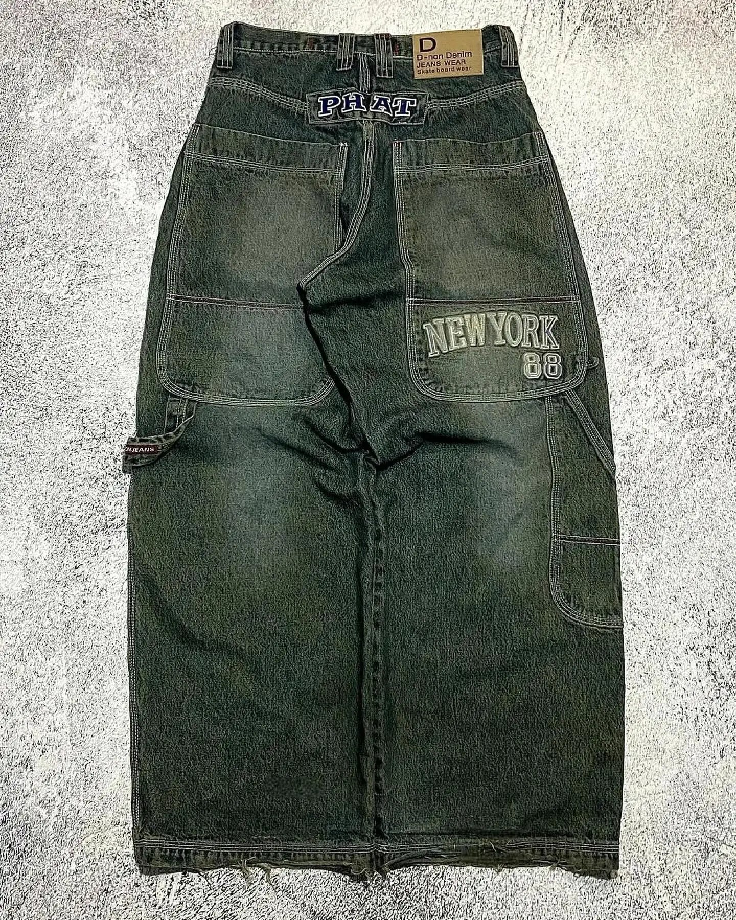 Jeans Baggy con Estampado Gráfico y Ojales